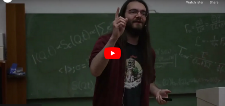 screenshot of the YouTube video preview of Benoît Richard's Slam at the 1st PIER science slam showing a young man raising his arm in front of a blackboard with nonsensical formulas