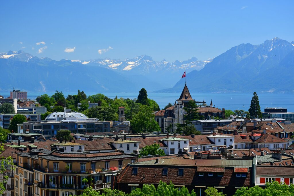 The city of Lausanne, the lake of Geneva and the alps